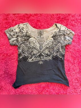 Rebel Saints Women's Black and Cream Graphic V‑Neck Top